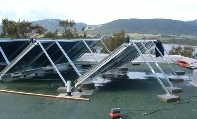 Capteurs solaire en toiture terrasse pour production eau chaude